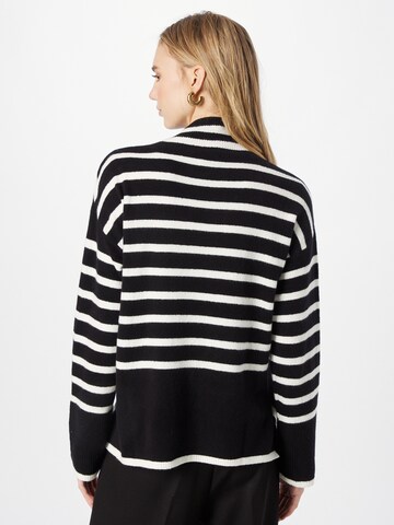 Cartoon Pullover in Schwarz