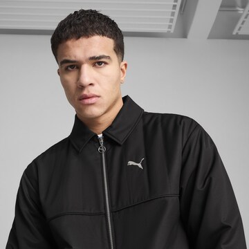PUMA Tussenjas 'Wardrobe Ess' in Zwart