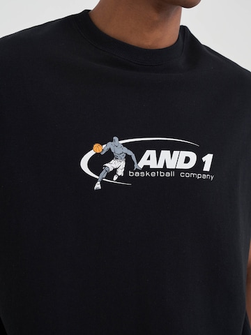 AND1 Collegepaita 'Timeout' värissä musta