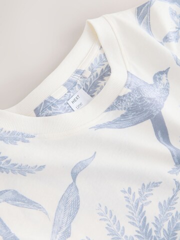 Next Νυχτικιά σε λευκό