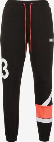 PUMA Tapered Workout Pants in Black: front