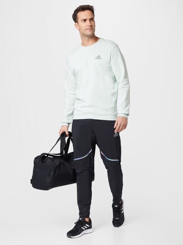 ADIDAS SPORTSWEAR Tapered Workout Pants 'Saturday Wind' in Black