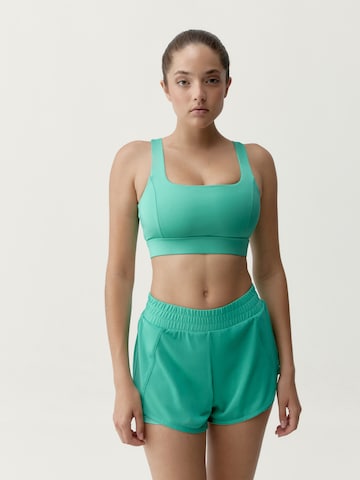 Born Bustier Sport bh 'Padma 2.0' in Groen: voorkant