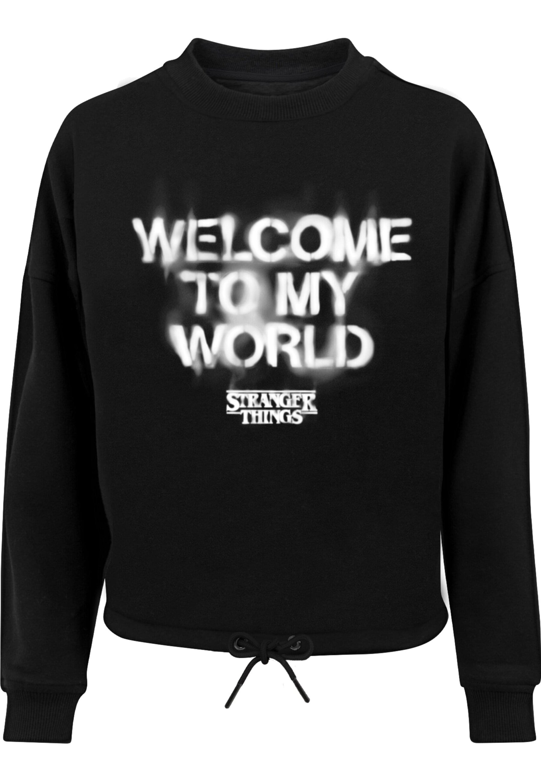 Sweat-shirt 'Stranger Things - Welcome To My World' ABSOLUTE CULT en noir : devant