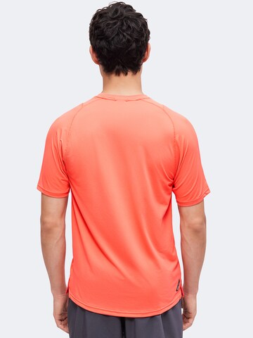 PUMA Performance shirt 'Pwrmode' in Orange