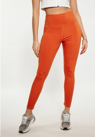 faina Athlsr Skinny Leggings in Orange: front