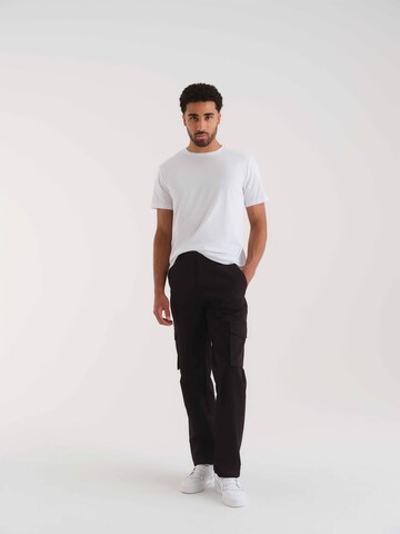 Loosefit Pantaloni cargo 'Jaron' di ABOUT YOU x Kevin Trapp in nero