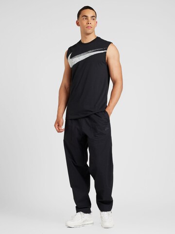 Loosefit Pantaloni 'CLUB BARCELONA' di Nike Sportswear in nero