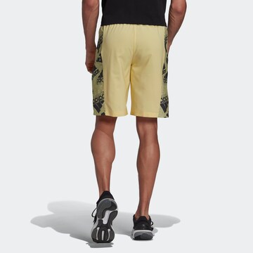 ADIDAS SPORTSWEAR Normalny krój Spodnie sportowe 'Essentials Brandlove' w kolorze żółty