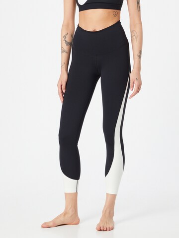 NIKE Skinny Workout Pants in Black: front