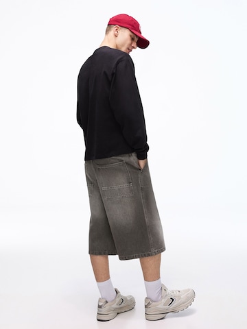 Bershka Široke hlačnice Kavbojke | siva barva