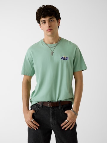 GUESS JEANS Tričko - Zelená: predná strana