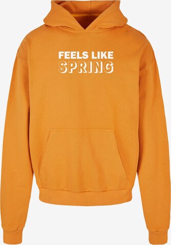 Merchcode Sweatshirt 'Spring - Feels Like' in Orange: predná strana