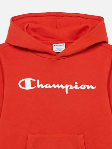 Champion Authentic Athletic Apparel Sweatshirt in Red