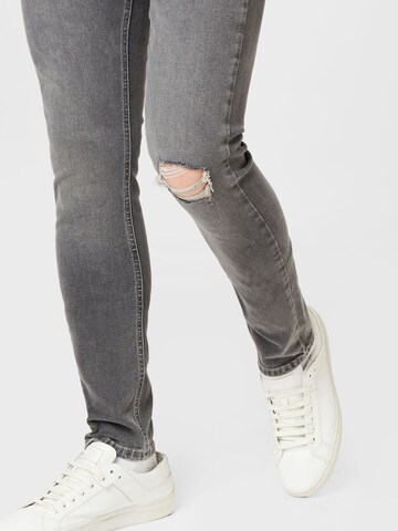 Coupe slim Jean 'SCANTON' Tommy Jeans en noir