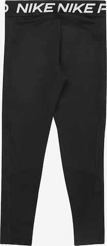 NIKE Skinny Sporthose in Schwarz