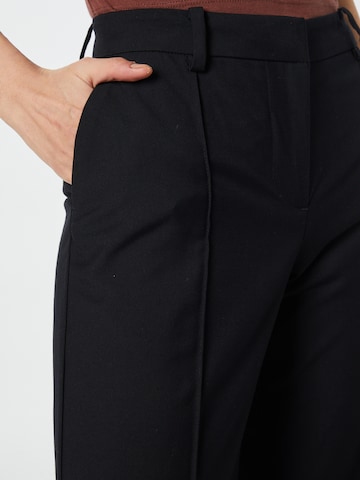 WEEKDAY Flared Trousers with creases 'Kendall' in Black