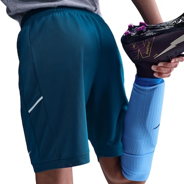 NIKE Regular Workout Pants in Blue