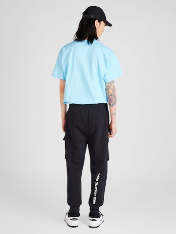 Nike Sportswear Tapered Gargohousut värissä musta