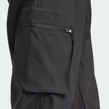 Tapered Pantaloni funzionali 'City Escape Premium' di ADIDAS SPORTSWEAR in nero