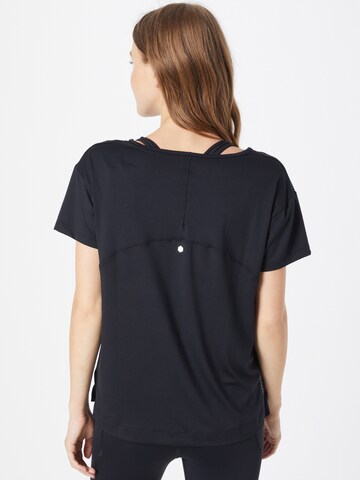 UNDER ARMOUR Performance Shirt in Black