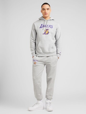 NEW ERA Tapered Trousers 'NBA ESSENTLS LOSLAK' in Grey