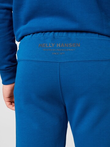 HELLY HANSEN Normální Sportovní kalhoty – modrá