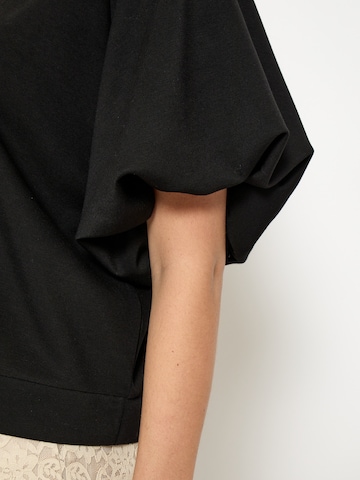 Maglietta 'Minnie' di Peppercorn in nero