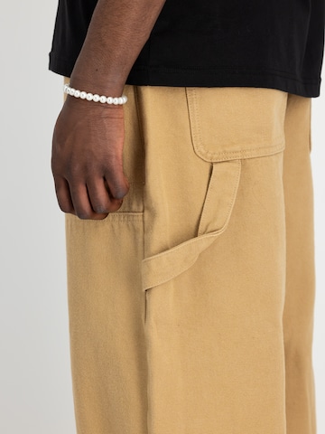 ALPHA INDUSTRIES Voľný strih Kapsáče 'Carpenter' - Béžová