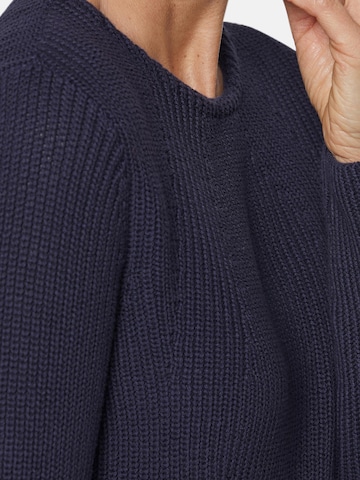 Goldner Pullover in Blau