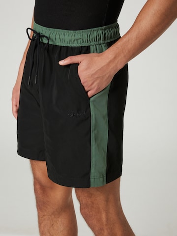 Sinned x ABOUT YOU - Loosefit Pantalón 'VICTOR' en verde