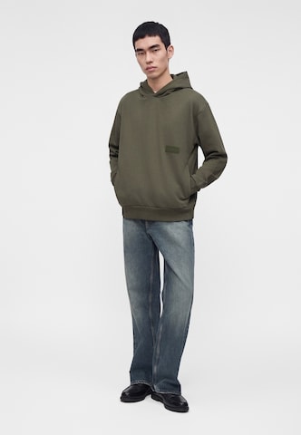 BOSS Sweatshirt in Grün