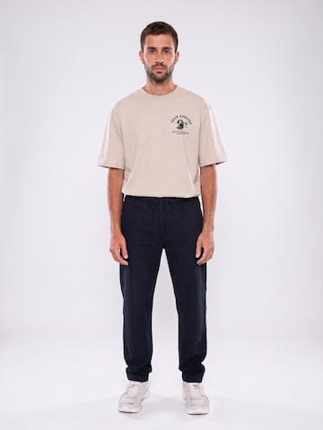 Thinking MU Baggy Broek 'STRAIGHT PANTS NAVY TRAVEL LIGHT' in Blauw
