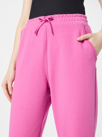 NIKE Tapered Sportsbukser i pink