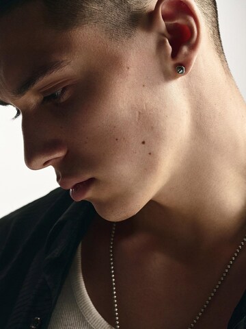 Orecchino 'SINGULA' di REYTEL in argento