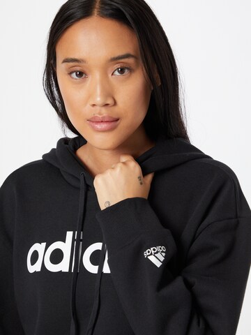 ADIDAS SPORTSWEAR Αθλητική μπλούζα φούτερ 'Essentials Fleece' σε μαύρο