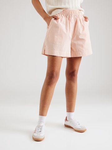 TOPSHOPLoosefit Hlače - crvena boja: prednji dio