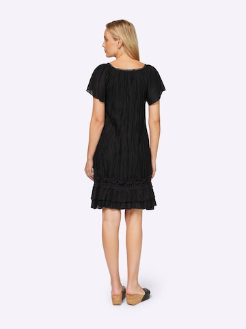 Rochie de la heine pe negru