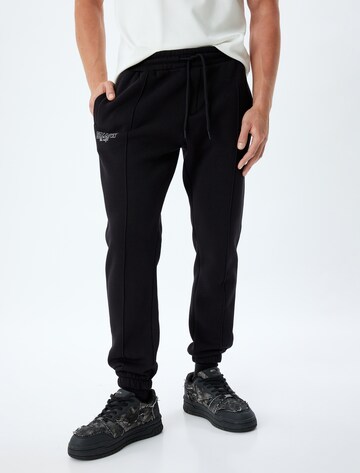 Koton Regular Trousers in Black: front