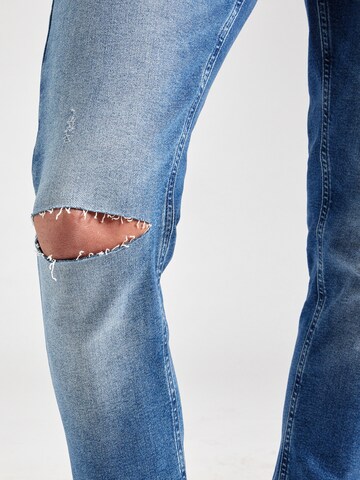 Tommy Jeans Kitsas Teksapüksid 'SIMON', värv sinine