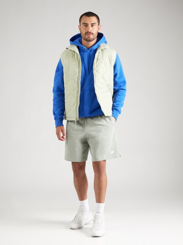 Nike Sportswear Loosefit Nadrág 'CLUB' - zöld