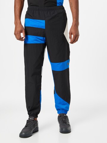 LACOSTE Loose fit Trousers in Black: front