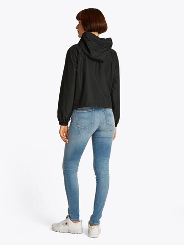 Tommy Jeans Φθινοπωρινό και ανοιξιάτικο μπουφάν 'Essential' σε μαύρο