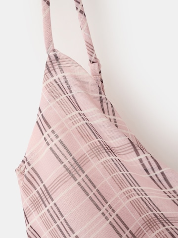 Top 'ILLO' di MANGO in rosa