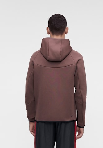 Nike Sportswear - Sudadera con cremallera 'Tech Fleece' en marrón: atrás