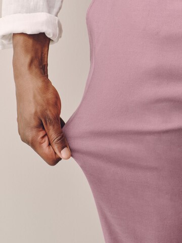 Slimfit Pantaloni con piega frontale di Next in rosa