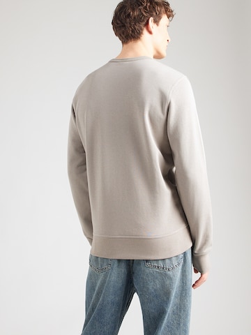 Champion Authentic Athletic Apparel Sweatshirt i grå