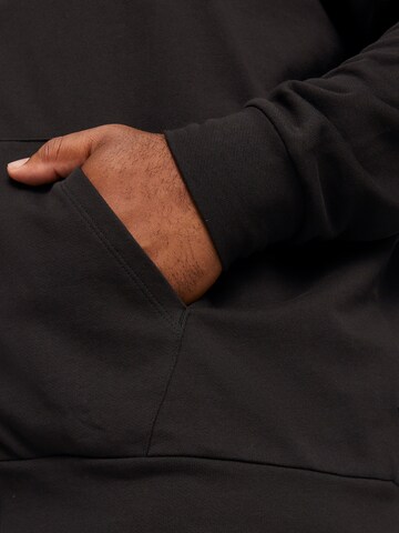 PUMA Bluza rozpinana 'Better Essentials' w kolorze czarny