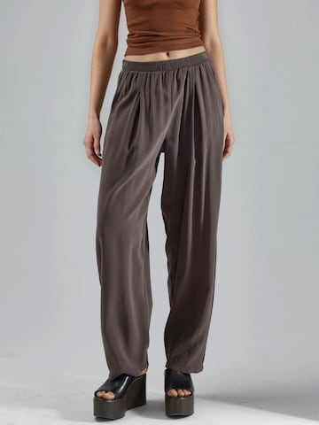 Busem Barrel Trousers in Brown: front