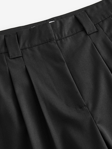 Loosefit Pantalon à pince Next en noir